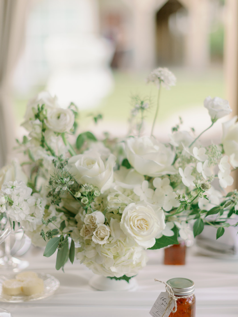 Detailed photo of a lush white floral centerpiece