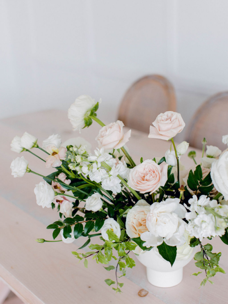 Detailed photo of a blush and white centrepiece with greenery Romantic Branding Shoot for Beth Jacobs Wedding & Events