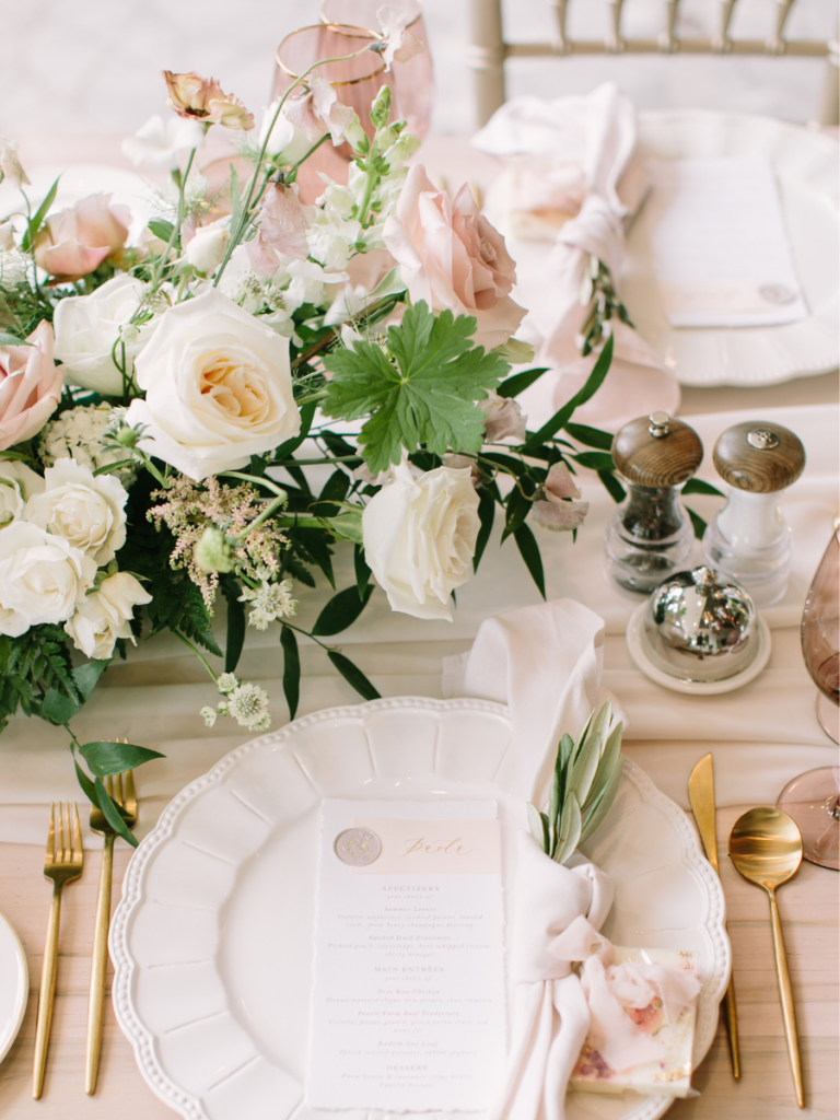 Place setting with blush and green florals