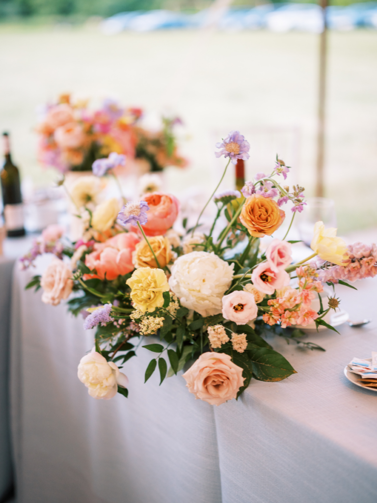 Colourful wedding flowers at family property wedding ceremony 